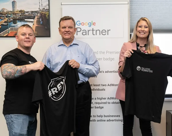 Real Estate Webmasters' CEO, Morgan Carey next to JB Goodwin and Erin Cestero from JB Goodwin.