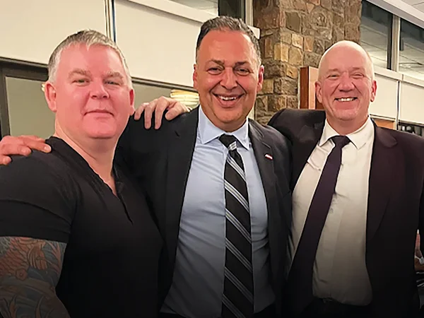 Real Estate Webmasters’ Morgan Carey (left) and Jeff Pady (right) with MaxWell Realty’s Bill Tarrabain (center)